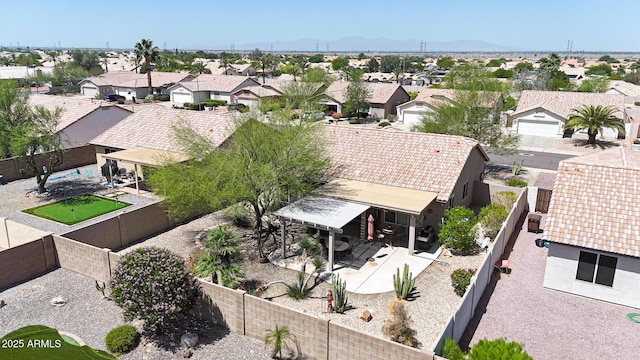 aerial perspective of suburban area with a mountain backdrop