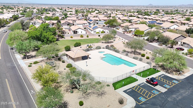 aerial view of residential area featuring a pool