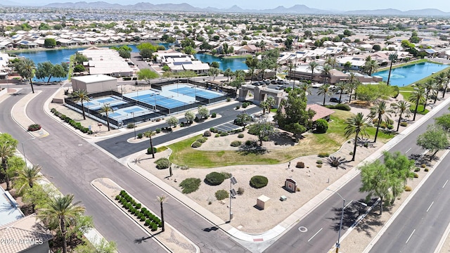 aerial view of residential area with a water and mountain view