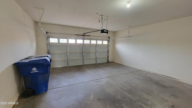 garage featuring a garage door opener