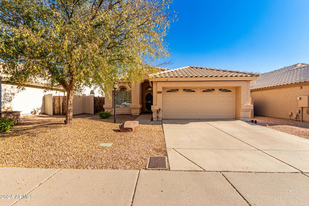 view of front of property with a garage