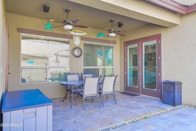 view of patio featuring french doors and ceiling fan