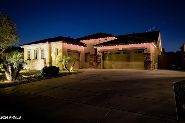 view of front of home with a garage