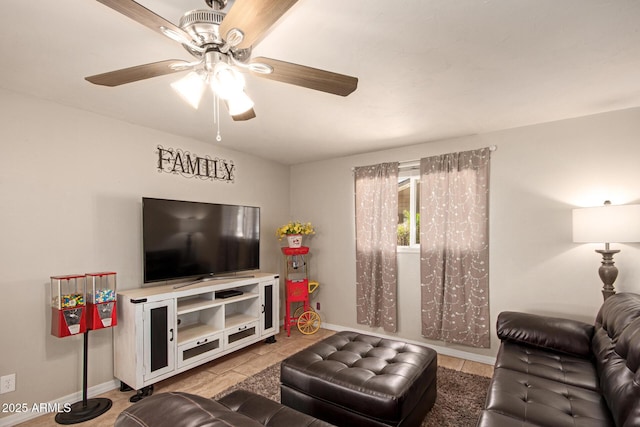 4145 W Hayward Ave, Phoenix, AZ 85051 - living area featuring baseboards and ceiling fan