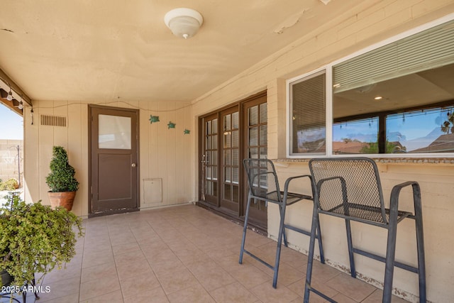 4145 W Hayward Ave, Phoenix, AZ 85051 - doorway to property featuring french doors and a patio
