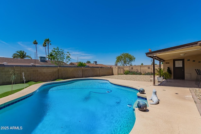 4145 W Hayward Ave, Phoenix, AZ 85051 - view of swimming pool with a patio area and a fenced backyard