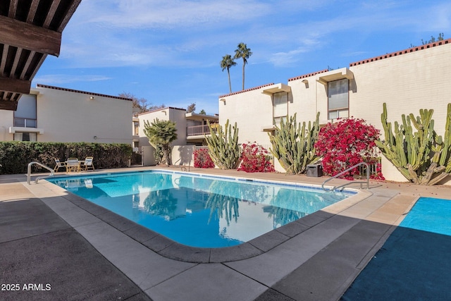 view of pool with a patio