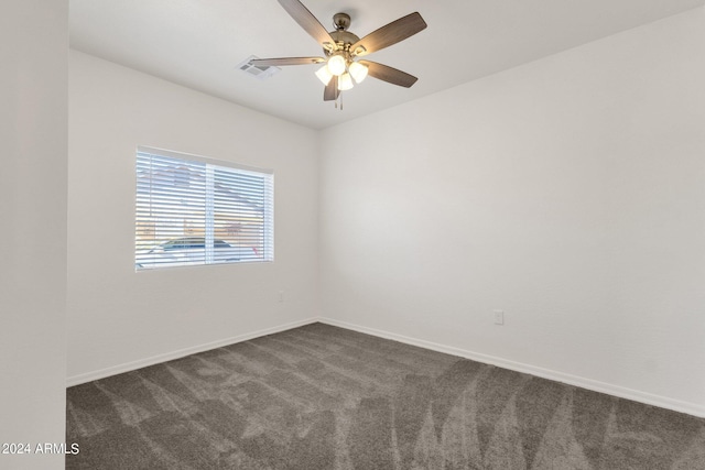 carpeted empty room with ceiling fan