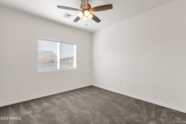 empty room with carpet flooring and ceiling fan