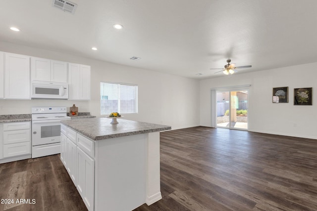 kitchen with white appliances, dark hardwood / wood-style floors, and ceiling fan