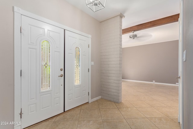 entrance foyer featuring light tile patterned floors