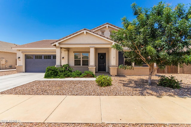 view of front of home with a garage