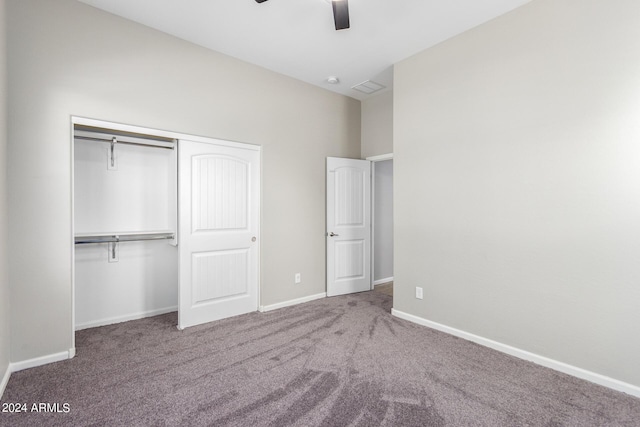 unfurnished bedroom with carpet floors, a closet, and ceiling fan