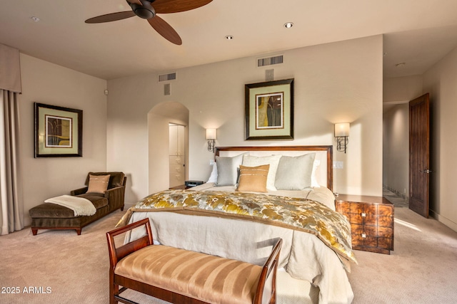 bedroom with light colored carpet and ceiling fan