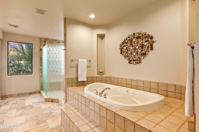 bathroom with plus walk in shower