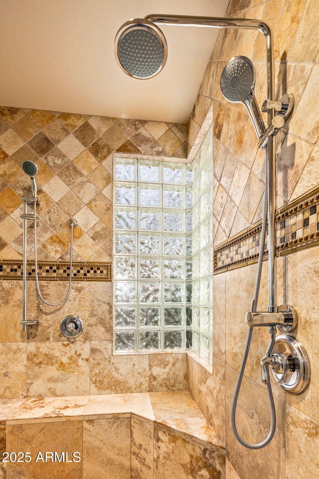 bathroom featuring tiled shower