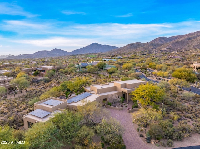 drone / aerial view featuring a mountain view