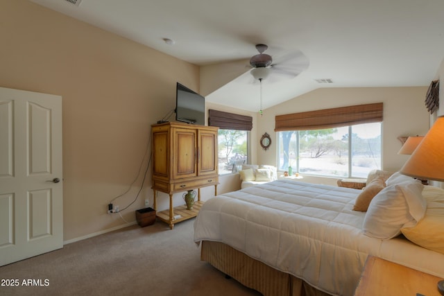 bedroom with lofted ceiling, ceiling fan, carpet floors, visible vents, and baseboards