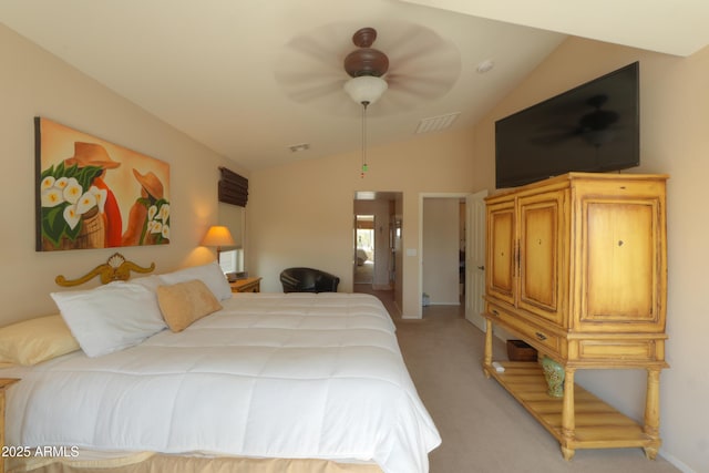 bedroom featuring a ceiling fan, light carpet, vaulted ceiling, and visible vents