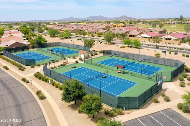 drone / aerial view with a residential view and a mountain view