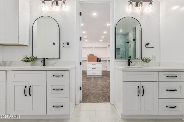 20412 W Thayer St, Buckeye, AZ 85396 - full bathroom with a stall shower, two vanities, and recessed lighting
