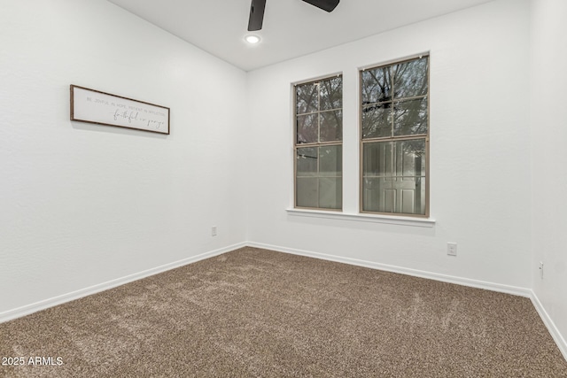 20412 W Thayer St, Buckeye, AZ 85396 - unfurnished room with dark colored carpet, baseboards, ceiling fan, and recessed lighting