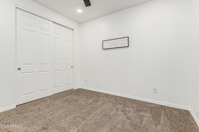 20412 W Thayer St, Buckeye, AZ 85396 - unfurnished bedroom with carpet floors, baseboards, a closet, a ceiling fan, and recessed lighting