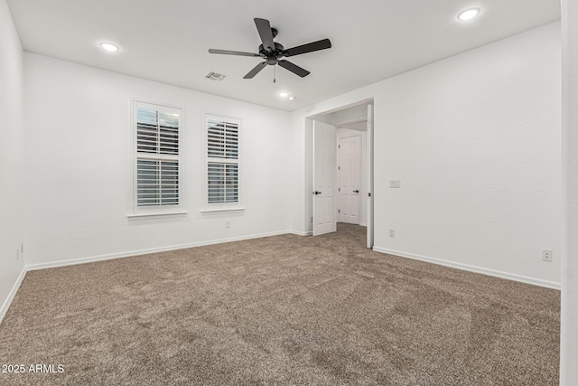 20412 W Thayer St, Buckeye, AZ 85396 - spare room with carpet, a ceiling fan, baseboards, and recessed lighting