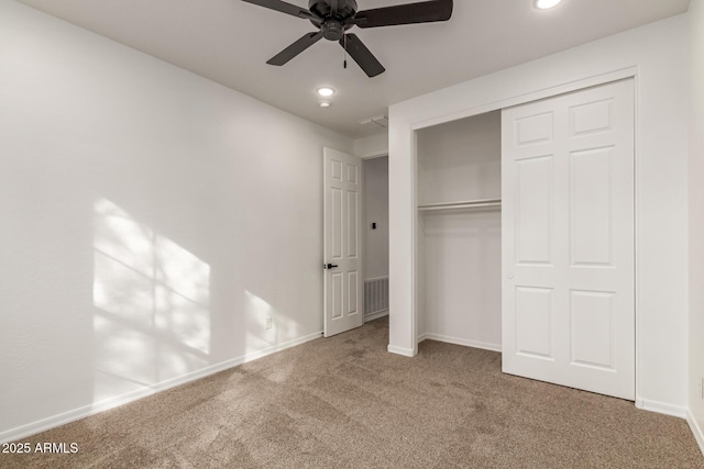 20412 W Thayer St, Buckeye, AZ 85396 - unfurnished bedroom with carpet, baseboards, recessed lighting, a closet, and a ceiling fan