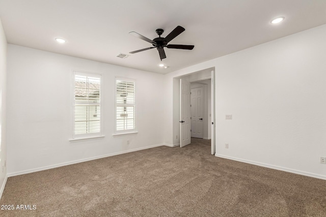 20412 W Thayer St, Buckeye, AZ 85396 - carpeted spare room with a ceiling fan, baseboards, and recessed lighting