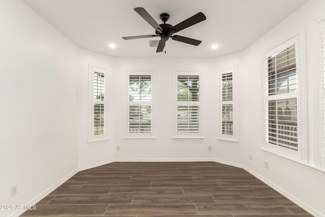 20412 W Thayer St, Buckeye, AZ 85396 - unfurnished room featuring dark wood-type flooring, ceiling fan, recessed lighting, and baseboards