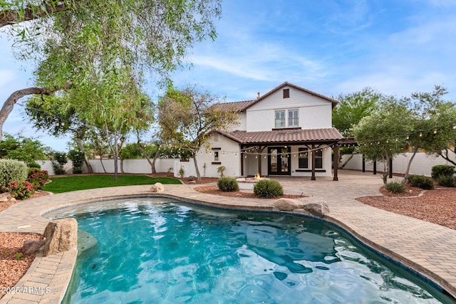 20412 W Thayer St, Buckeye, AZ 85396 - view of swimming pool with french doors, a patio, and a fenced backyard