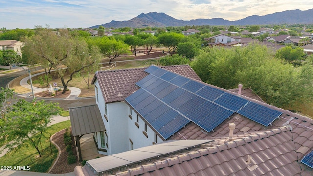 20412 W Thayer St, Buckeye, AZ 85396 - aerial perspective of suburban area featuring a mountainous background