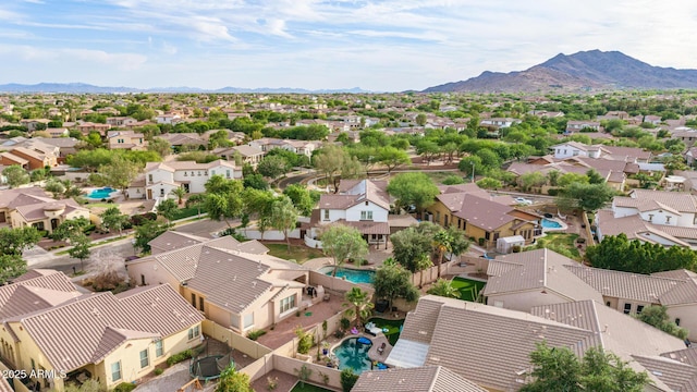 20412 W Thayer St, Buckeye, AZ 85396 - aerial view of residential area featuring a pool area and mountains