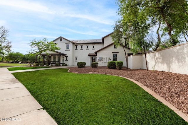 20412 W Thayer St, Buckeye, AZ 85396 - view of front of property featuring a gazebo, solar panels, and stucco siding
