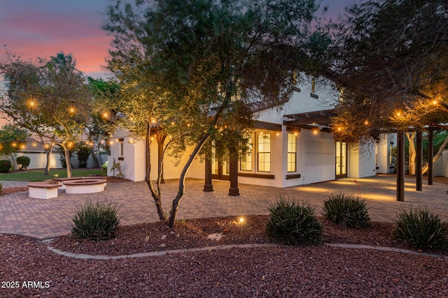 20412 W Thayer St, Buckeye, AZ 85396 - view of front of home featuring a patio area and stucco siding