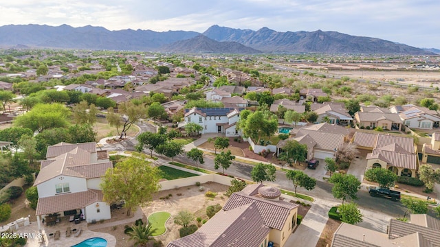 20412 W Thayer St, Buckeye, AZ 85396 - aerial perspective of suburban area featuring a mountainous background