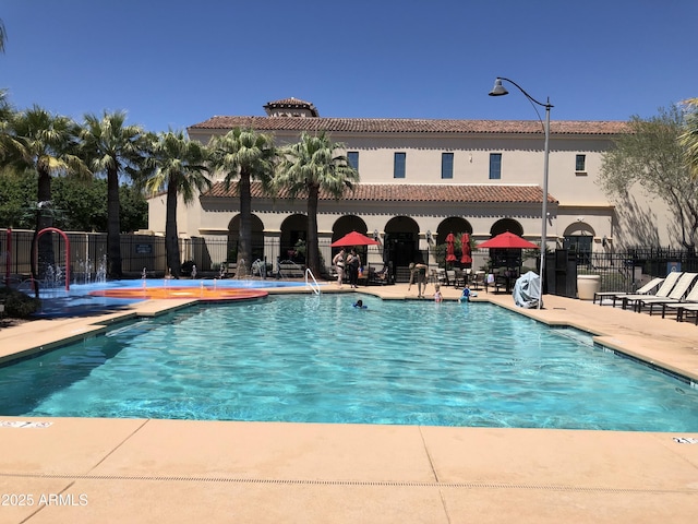 20412 W Thayer St, Buckeye, AZ 85396 - community pool with a patio