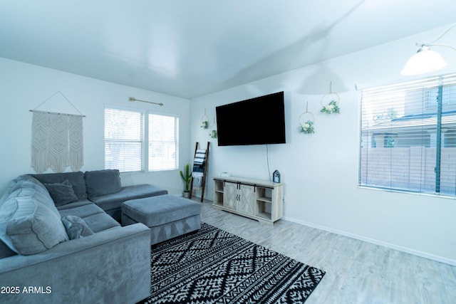 12161 W Flanagan St, Avondale, AZ 85323 - living room with light wood finished floors and baseboards