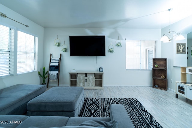 12161 W Flanagan St, Avondale, AZ 85323 - living area featuring a chandelier and wood finished floors