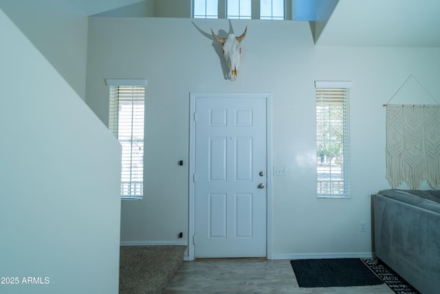 12161 W Flanagan St, Avondale, AZ 85323 - foyer entrance with healthy amount of natural light and wood finished floors