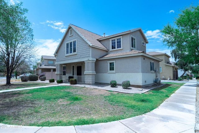 12161 W Flanagan St, Avondale, AZ 85323 - view of front of home featuring stucco siding, a porch, a front lawn, and stone siding