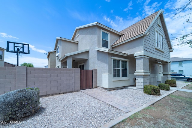 12161 W Flanagan St, Avondale, AZ 85323 - view of property exterior with a gate and stucco siding