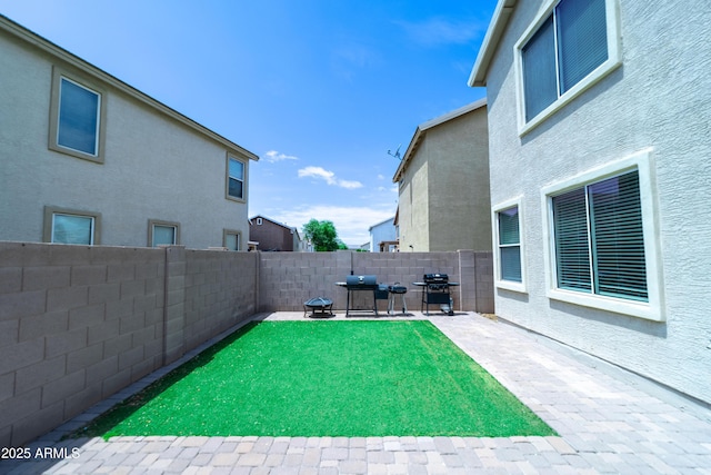 12161 W Flanagan St, Avondale, AZ 85323 - fenced backyard featuring a patio
