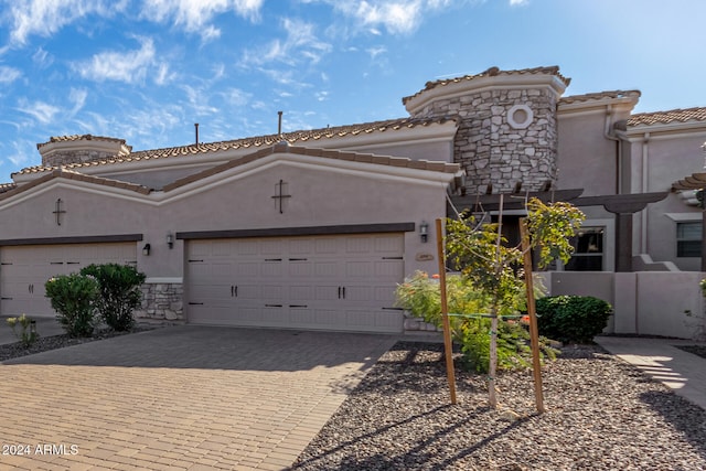 view of front of home featuring a garage