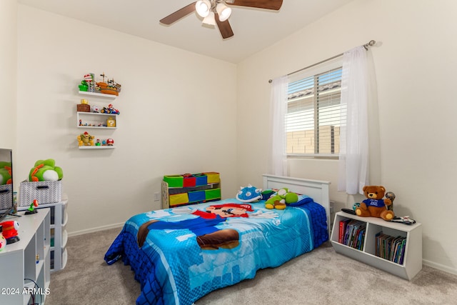 bedroom featuring ceiling fan and light colored carpet