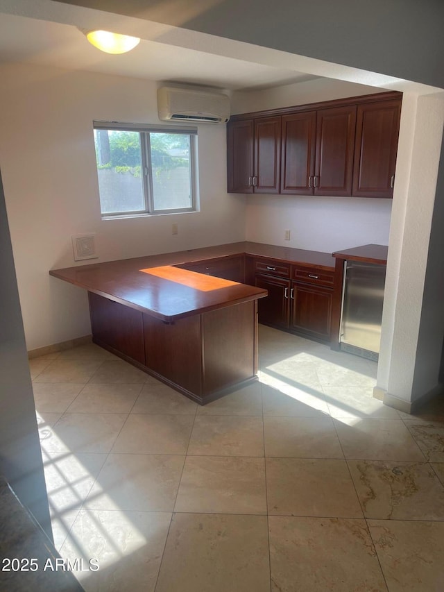 1059 E Broadmor Dr, Tempe, AZ 85282 - unfurnished office featuring an AC wall unit and baseboards