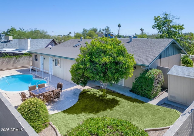 1059 E Broadmor Dr, Tempe, AZ 85282 - back of property with a shingled roof and a patio