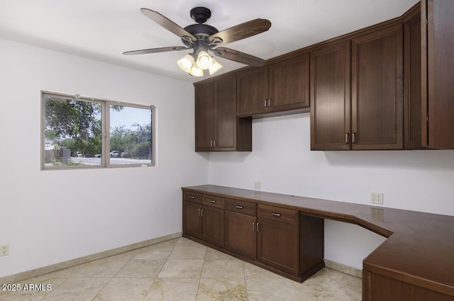 1059 E Broadmor Dr, Tempe, AZ 85282 - kitchen featuring dark countertops, a ceiling fan, and dark brown cabinetry