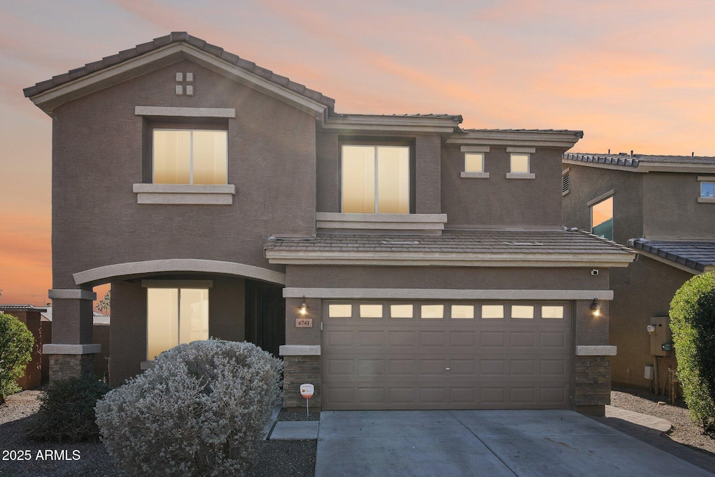 view of front of home featuring a garage